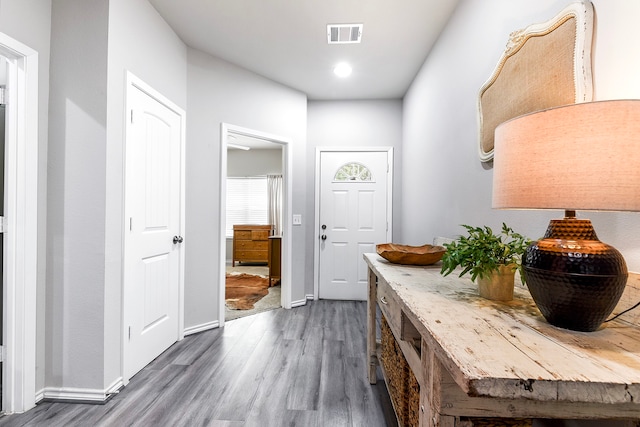 hallway with dark wood-type flooring