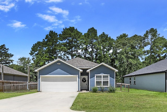 view of front facade with a garage and a front yard