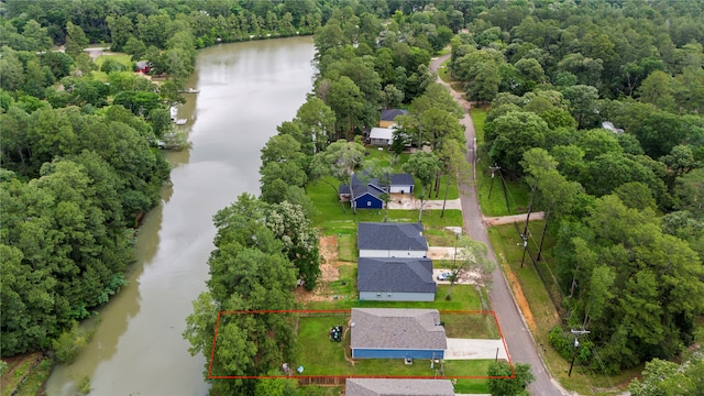 drone / aerial view featuring a water view