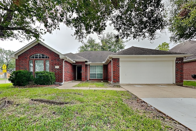 ranch-style house with a garage and a front yard