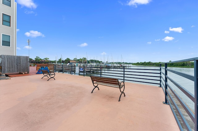 view of patio featuring a water view