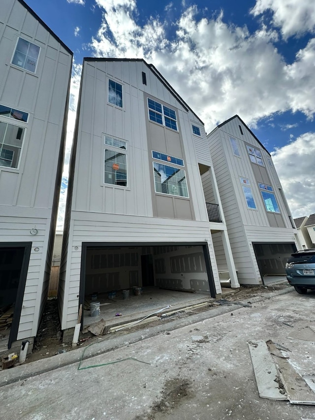 view of side of property with a garage