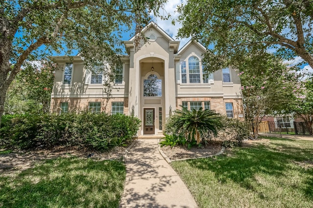 view of front facade with a front lawn