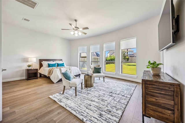 bedroom featuring ceiling fan and light hardwood / wood-style flooring