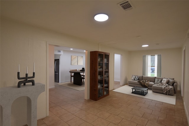 living room with light tile patterned floors