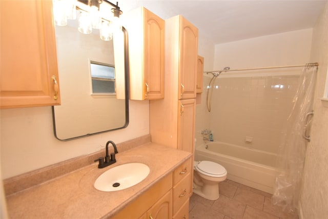 full bathroom featuring toilet, vanity, shower / bath combo with shower curtain, and tile patterned flooring