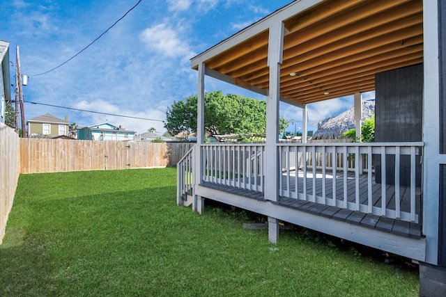 view of yard featuring a wooden deck