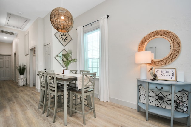 dining room featuring light hardwood / wood-style flooring