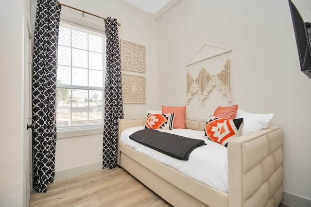 bedroom featuring light wood-type flooring