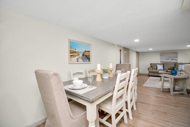 dining room with light hardwood / wood-style floors