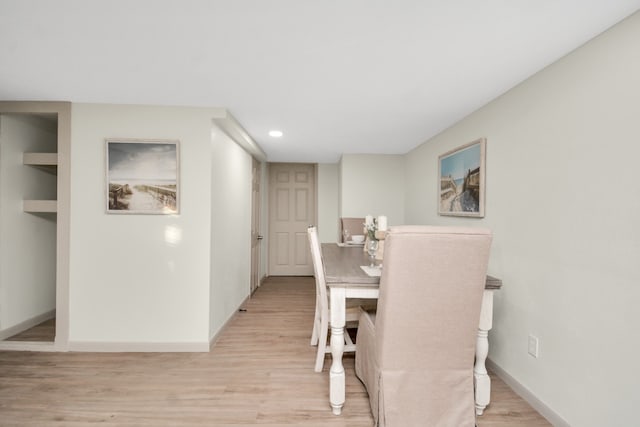 dining space featuring light hardwood / wood-style flooring