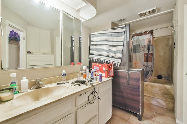 bathroom featuring shower / tub combo with curtain, vanity, and tile patterned flooring