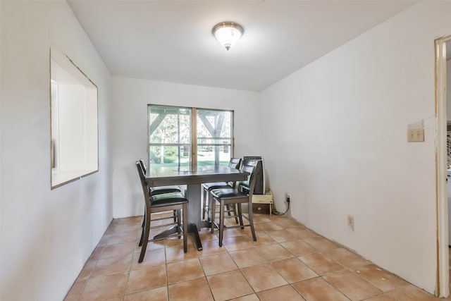 view of tiled dining space