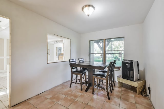 dining room with light tile patterned floors