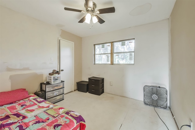 bedroom with concrete flooring and ceiling fan