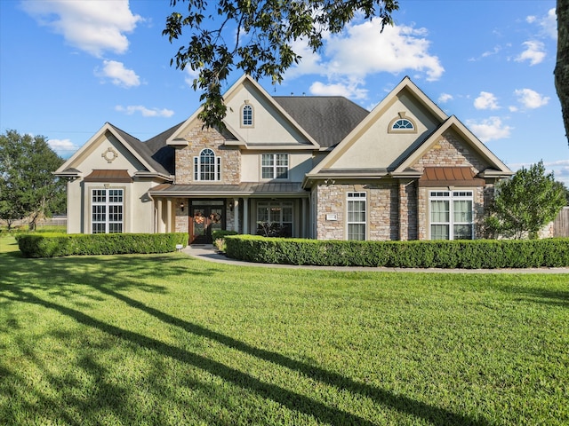 craftsman house with a front yard