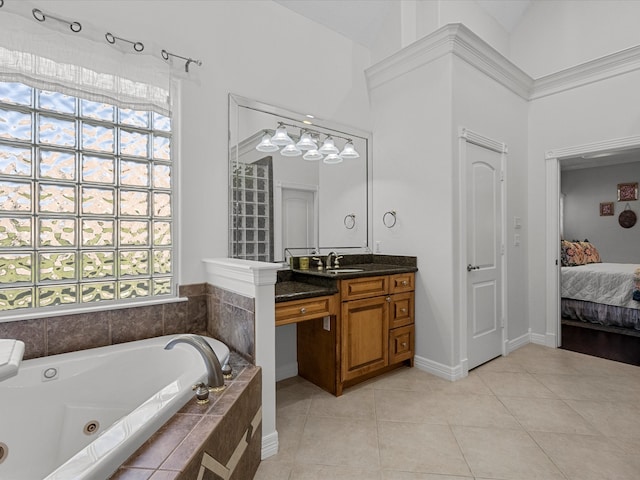 bathroom with a relaxing tiled tub, lofted ceiling, tile patterned floors, and vanity