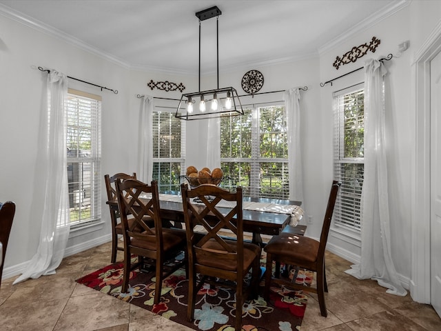 dining space featuring a wealth of natural light, an inviting chandelier, and crown molding