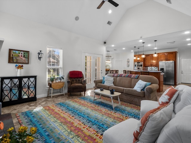 living room featuring high vaulted ceiling and ceiling fan