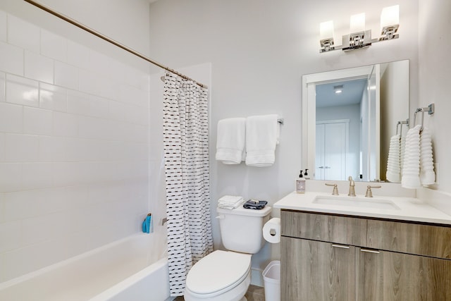 full bathroom featuring vanity, toilet, and shower / bath combination with curtain