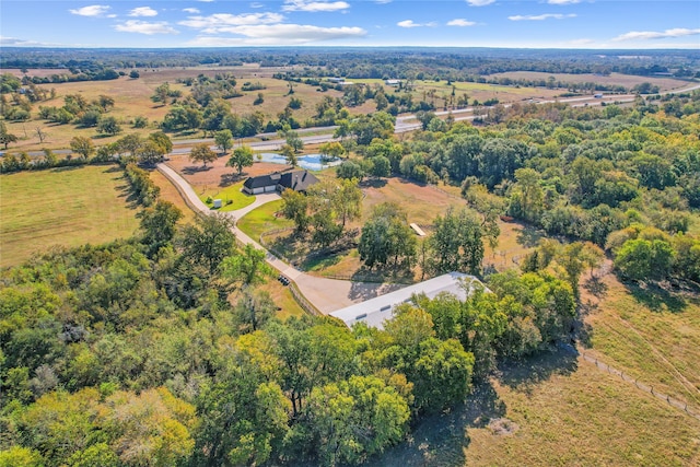 birds eye view of property featuring a rural view