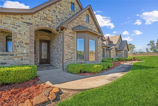 exterior space with a front yard