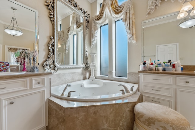 bathroom featuring a wealth of natural light, vanity, tiled tub, and crown molding