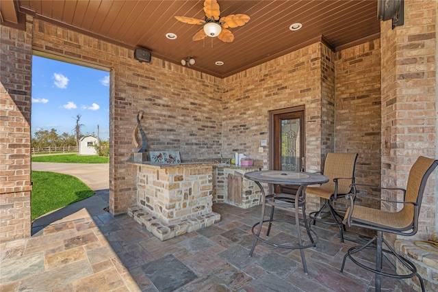 view of patio with ceiling fan