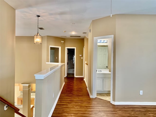 hallway featuring wood-type flooring