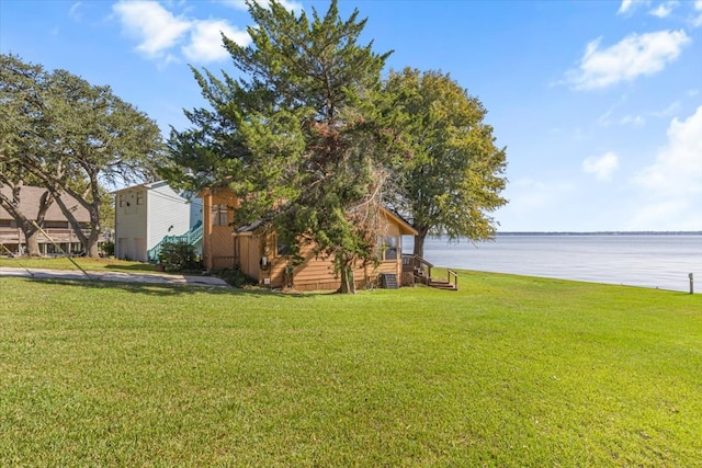 view of yard with a water view