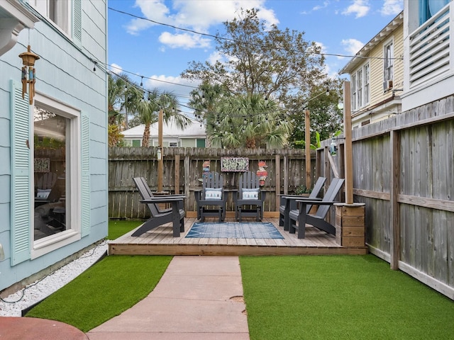 view of yard with a deck