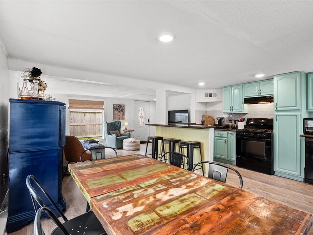 dining area featuring light hardwood / wood-style flooring