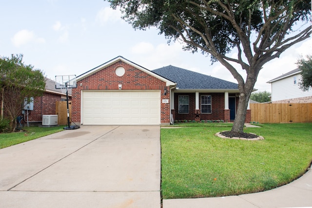 ranch-style house featuring a front lawn and a garage