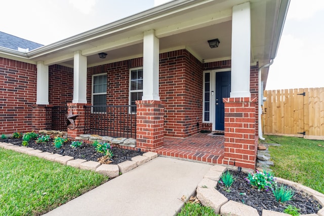 property entrance with covered porch