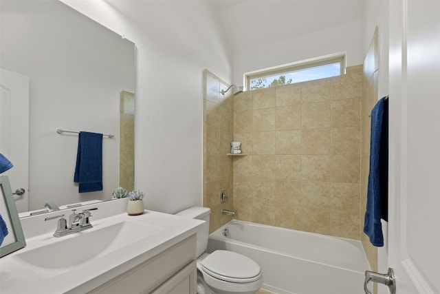 full bathroom featuring vanity, toilet, and tiled shower / bath