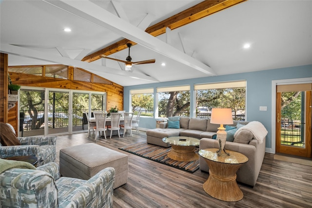 sunroom with vaulted ceiling with beams and ceiling fan