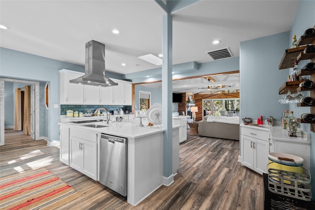 kitchen with island range hood, white cabinetry, dark hardwood / wood-style flooring, sink, and stainless steel dishwasher