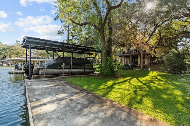 view of dock featuring a yard and a water view