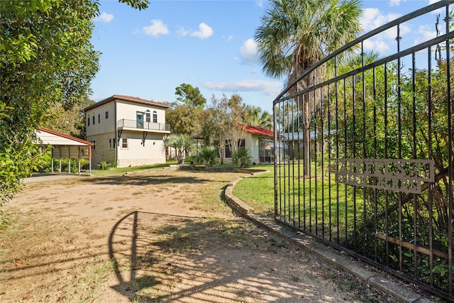 view of yard with a carport