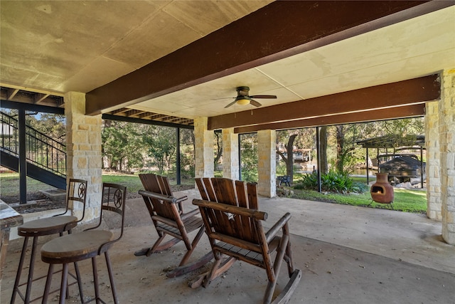 view of patio / terrace featuring ceiling fan