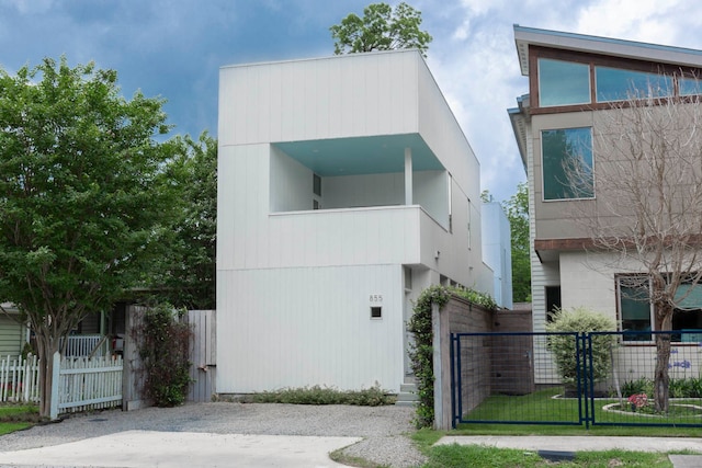 modern home with a front lawn