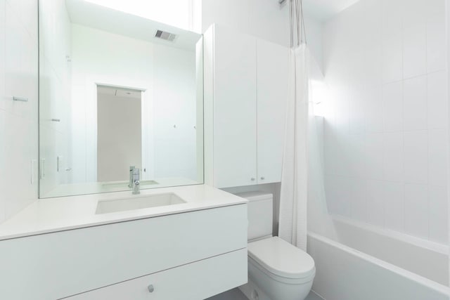 full bathroom with toilet, vanity, and shower / bathtub combination with curtain