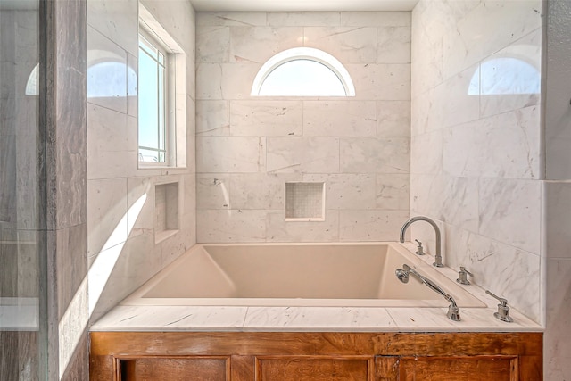 bathroom with a bathing tub