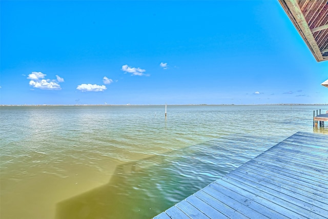 water view featuring a dock