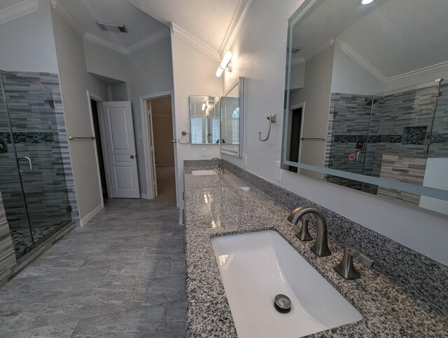 bathroom featuring lofted ceiling, vanity, an enclosed shower, and crown molding