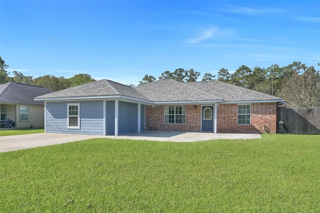 ranch-style home with a patio area and a front yard