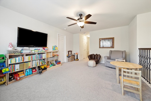 playroom featuring carpet flooring and ceiling fan