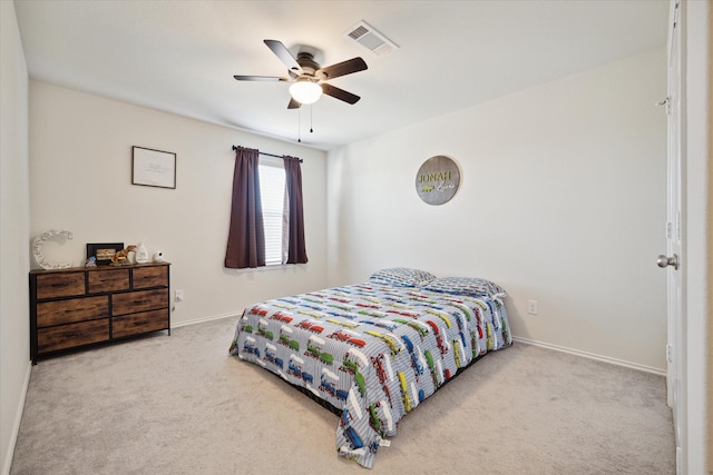 bedroom featuring ceiling fan and carpet floors