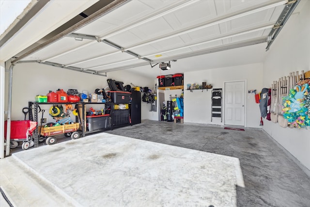 garage featuring a garage door opener