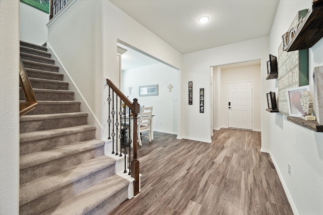 foyer entrance featuring hardwood / wood-style flooring